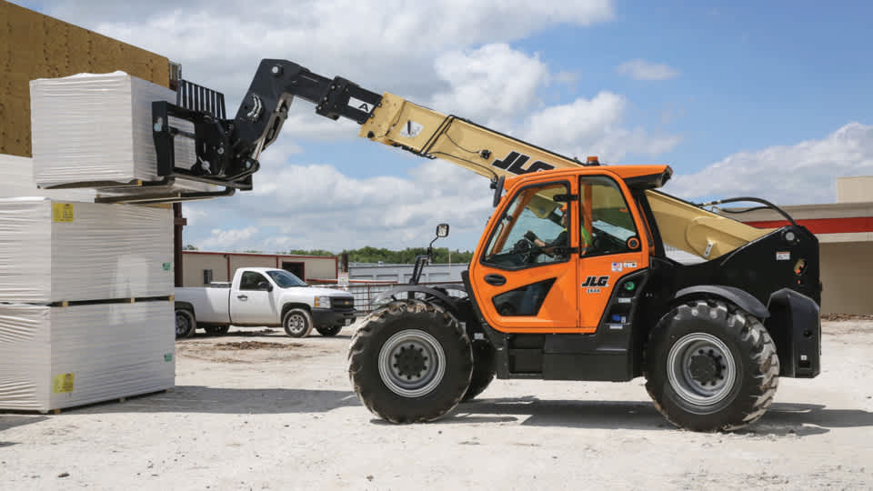 Telehandler lifting an object