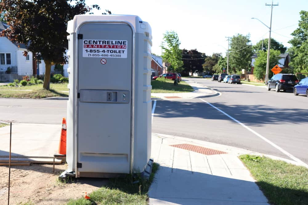 rented porta potty on a construction site