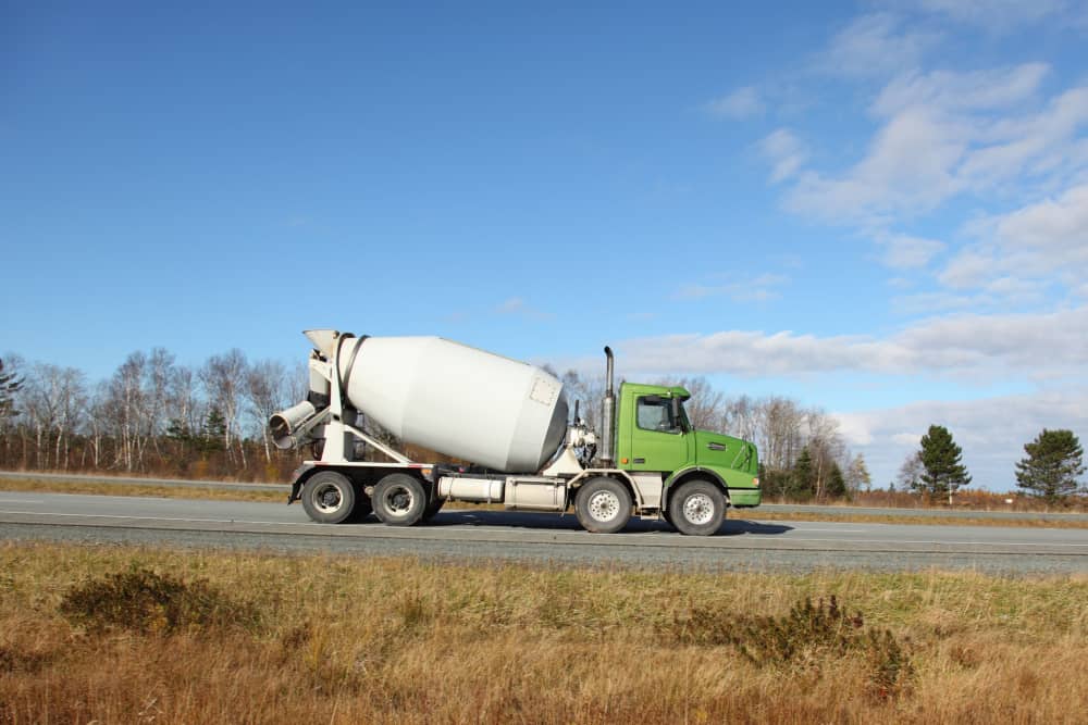 Cement truck driving on a highway