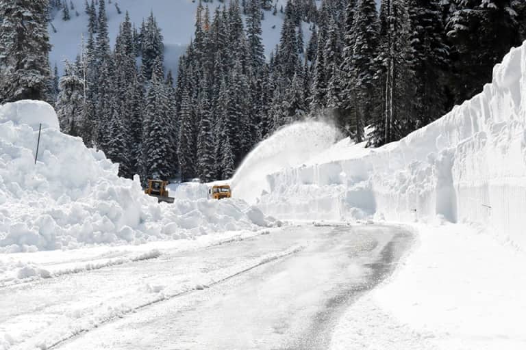 telehandler machine clearing snow