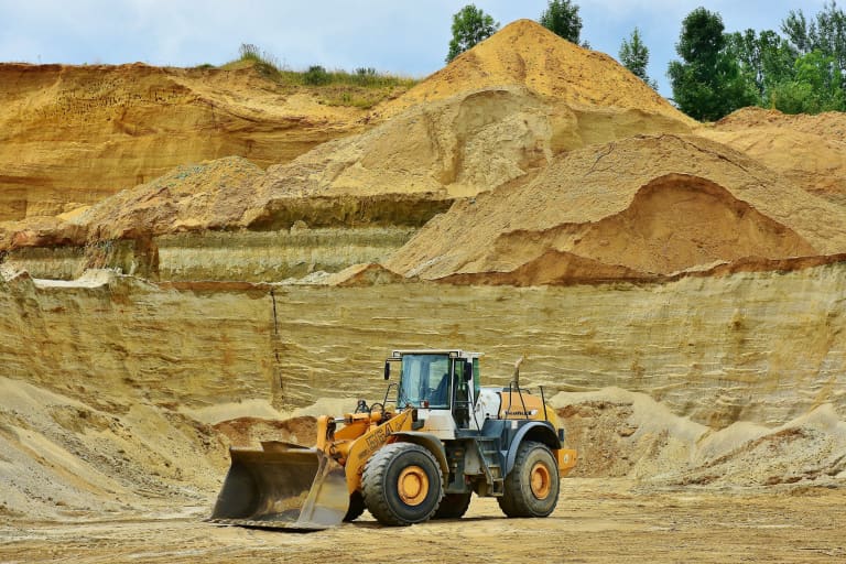 skid steer moving dirt