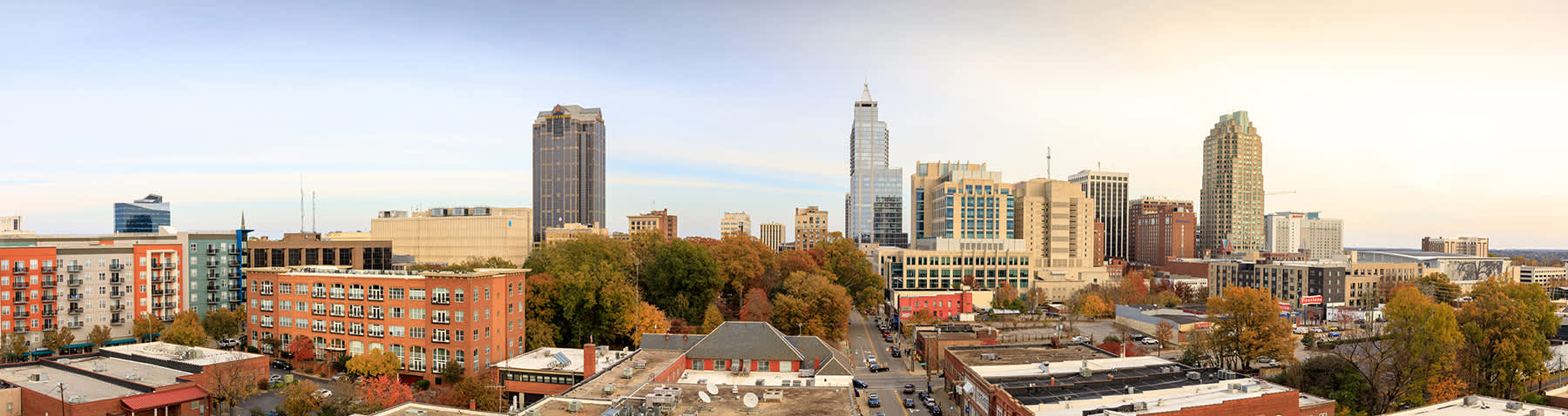 Raleigh north carolina skyline with sun setting in background