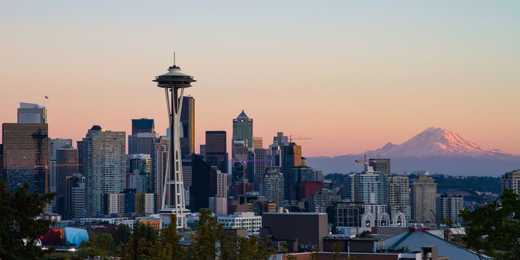 Seattle's skyline and downtown core with mountains in the background