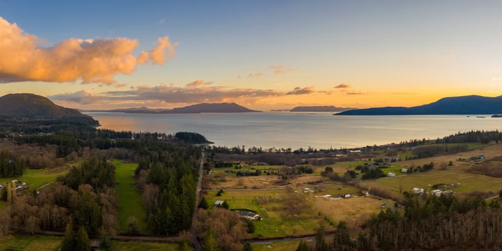 Aerial view of Bellingham Bay and the surrounding mountains and ocean