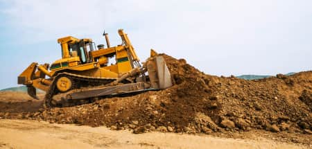 bulldozer moving dirt