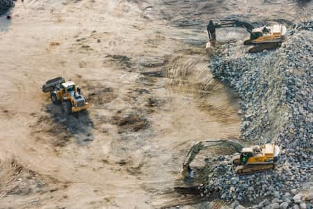 Heavy equipment on a large construction site