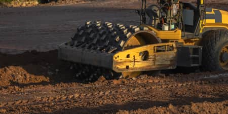 road roller on a construction job site