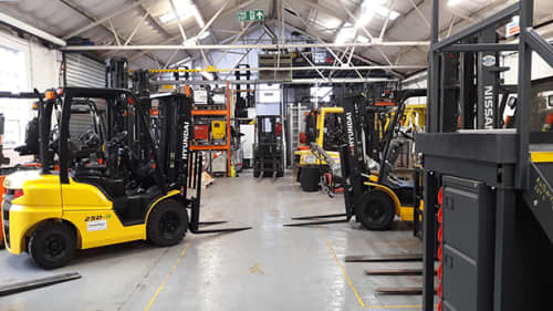 forklifts in a warehouse