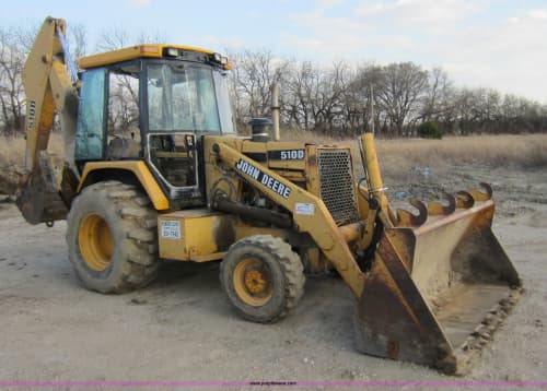 Backhoe machine on dirt