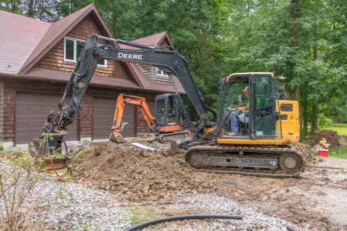 Mini excavator rental with attachment