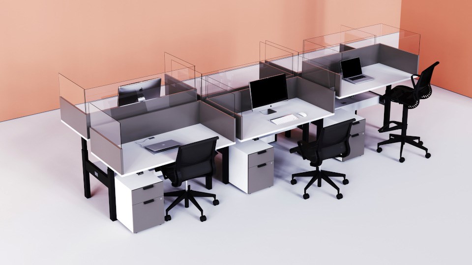 Workspace with six desks and chairs and glass shields separating them