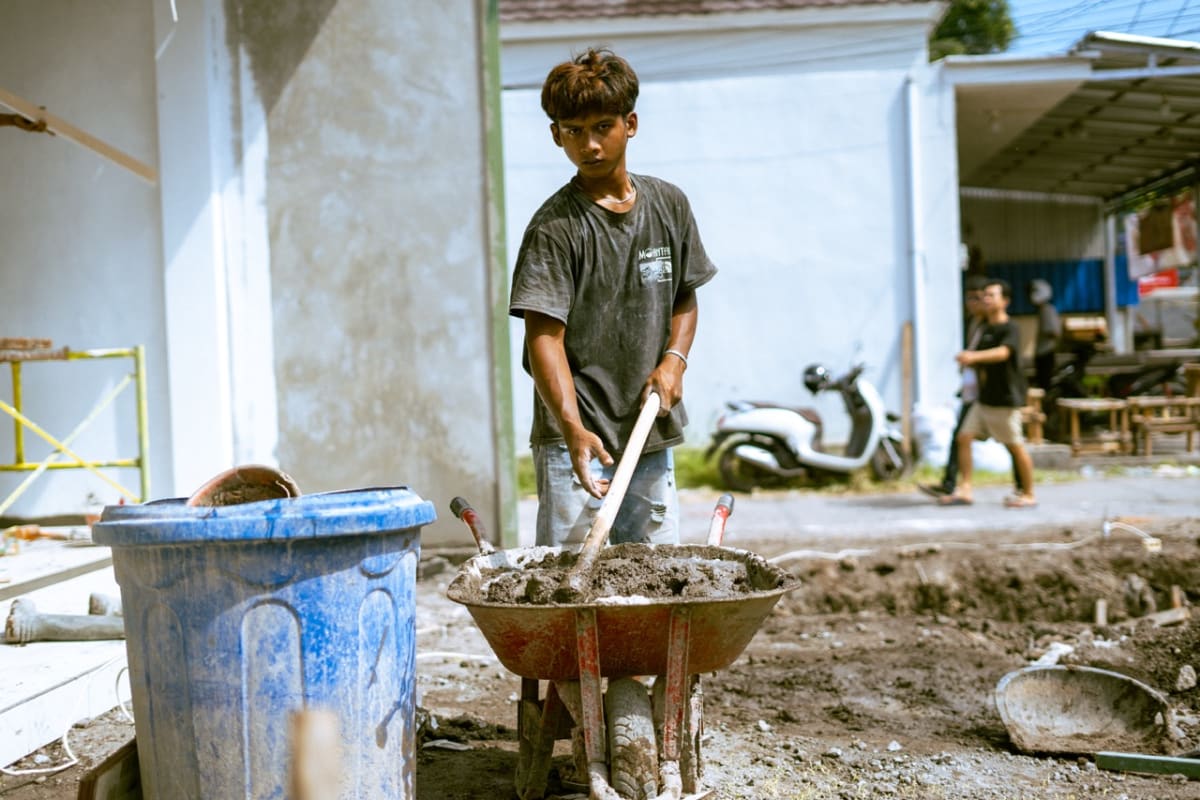 Construction worker on a Bali job site