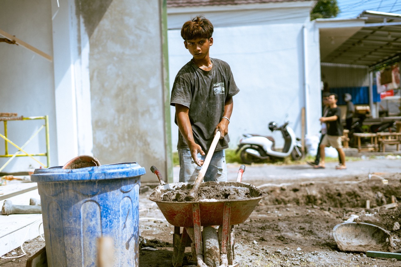 Construction worker on a Bali job site