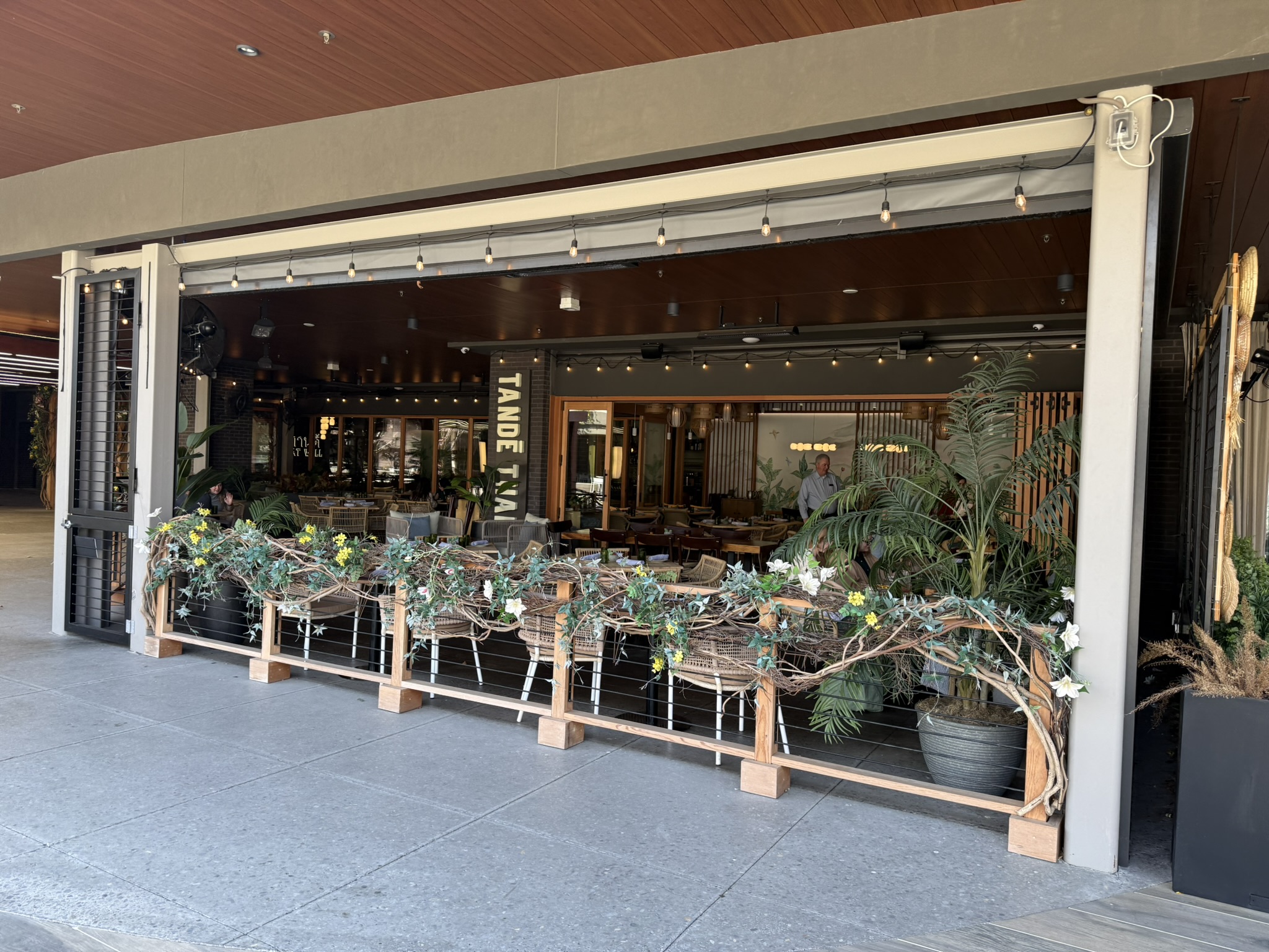 Grandscape dining setting near Downward Dog Puppy Yoga
