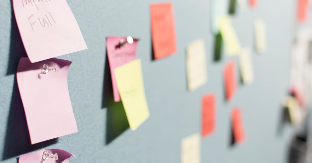 Sticky-note planning wall representing ClickUp documents and project notes