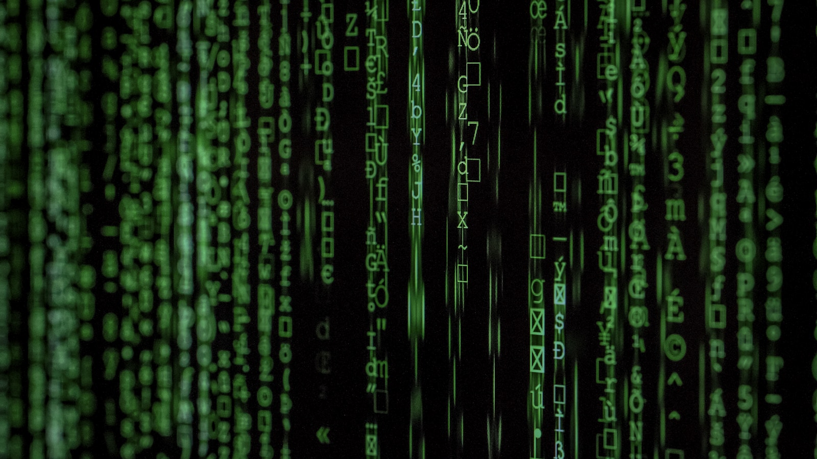 Rows of green computer code on a dark screen