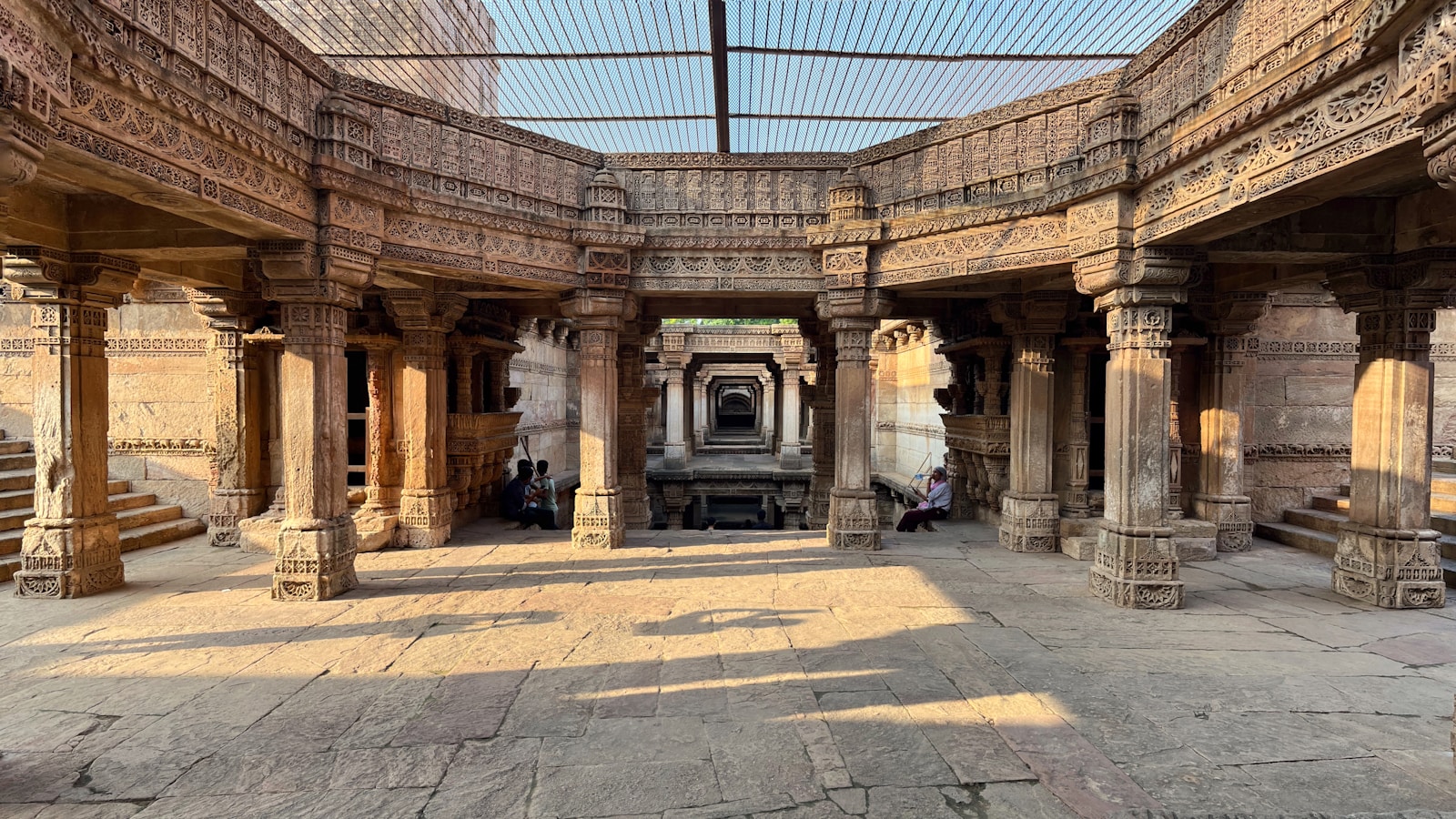 Symmetrical stone courtyard with layered architectural structure