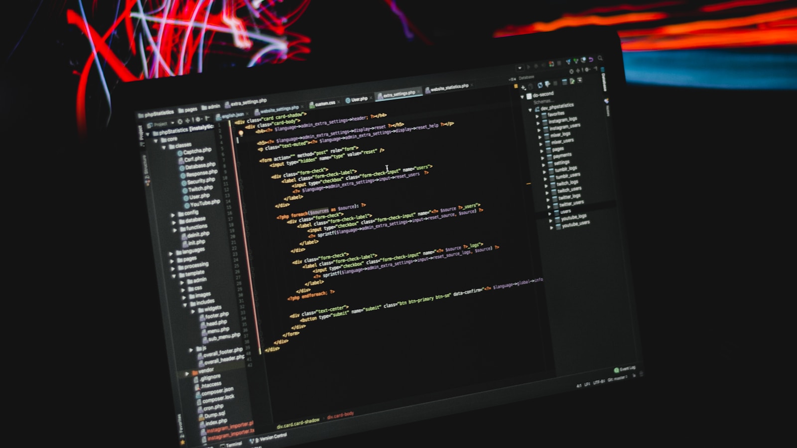 Laptop screen displaying source code