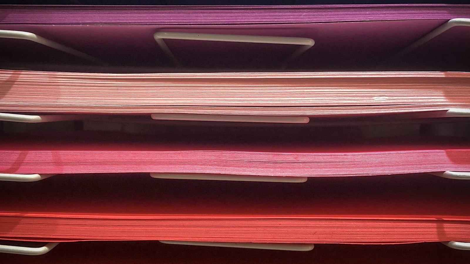 Stack of colorful document folders
