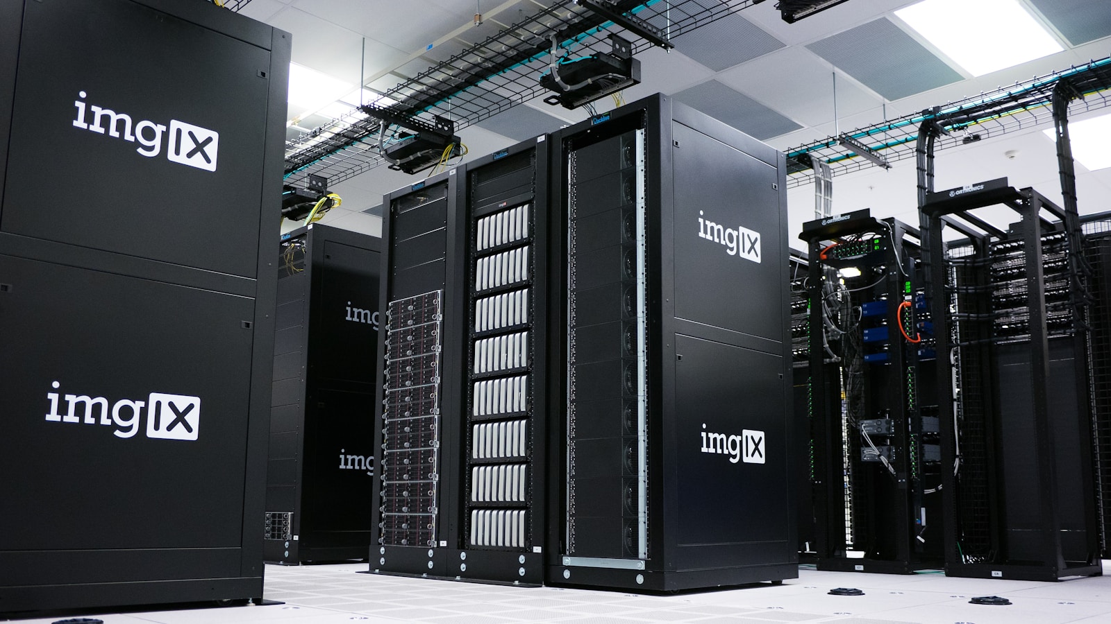 Rows of black server cabinets in a data center