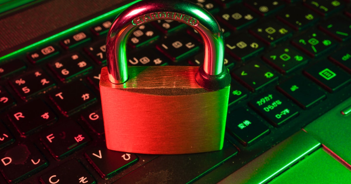 Digital padlock on a circuit board background representing authentication