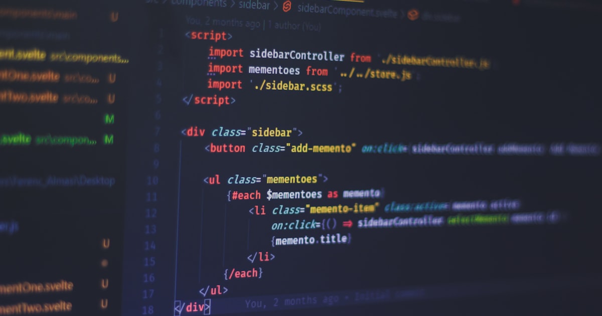 Single developer working at a clean desk with a laptop