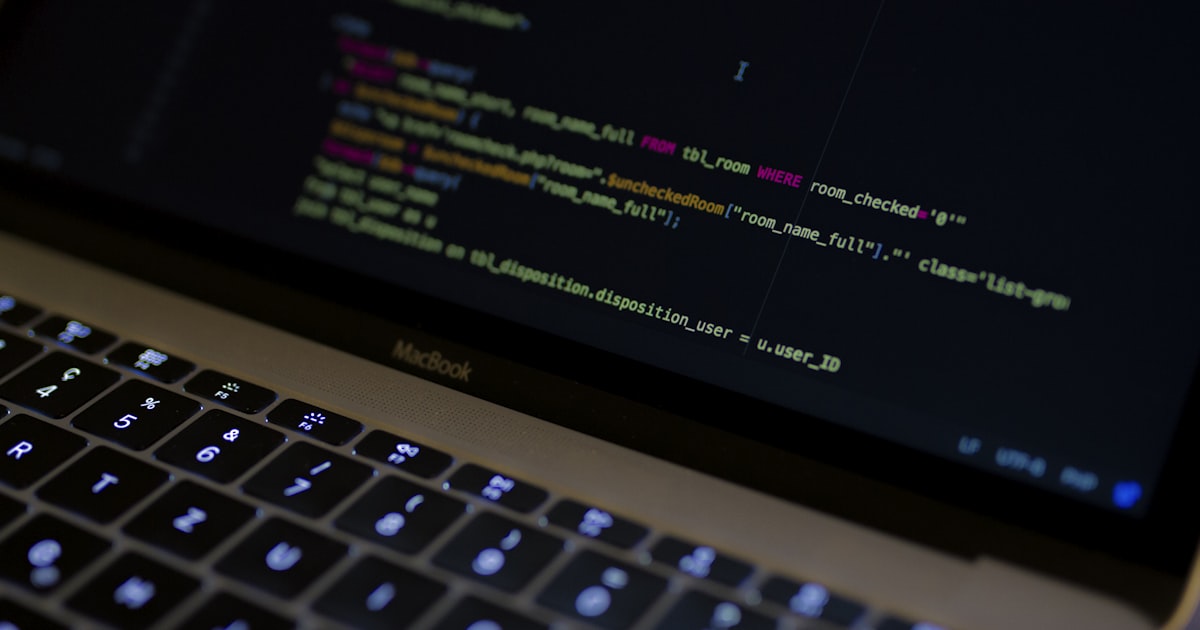 Abstract data grid and database tables on a dark screen