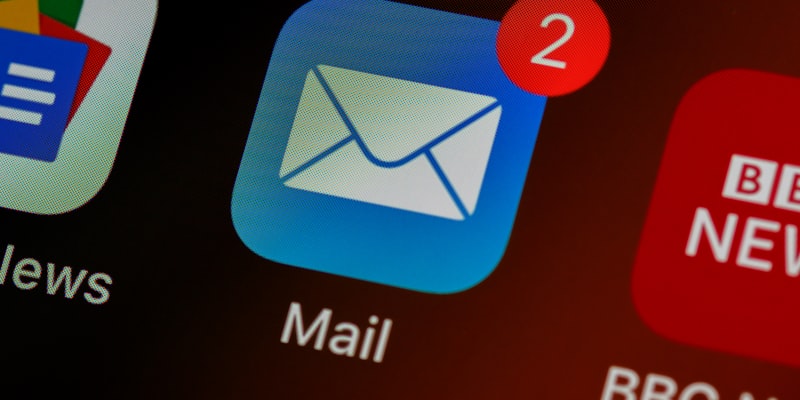 Two email clients side by side on a desktop screen
