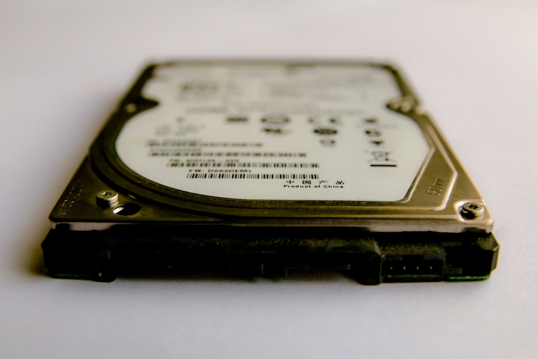 Old external hard drive or dusty backup drive on a shelf, representing the practical question of whether your notes survive the company that currently hosts them