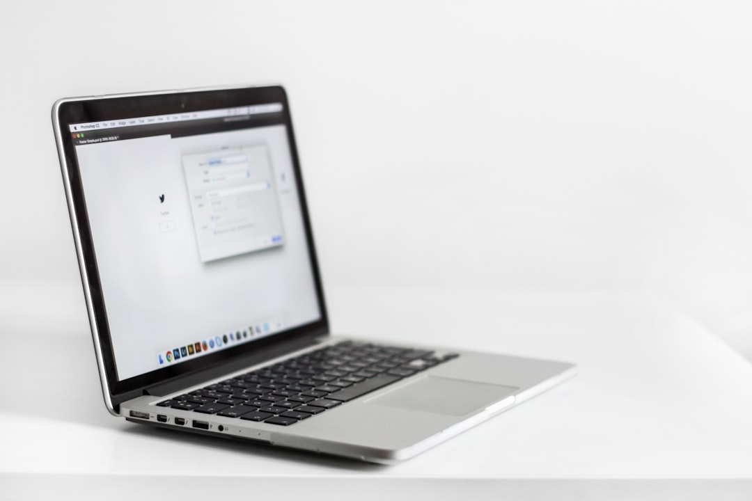 Personal desk with laptop and physical notebook, illustrating notes and tasks you control on accounts you own
