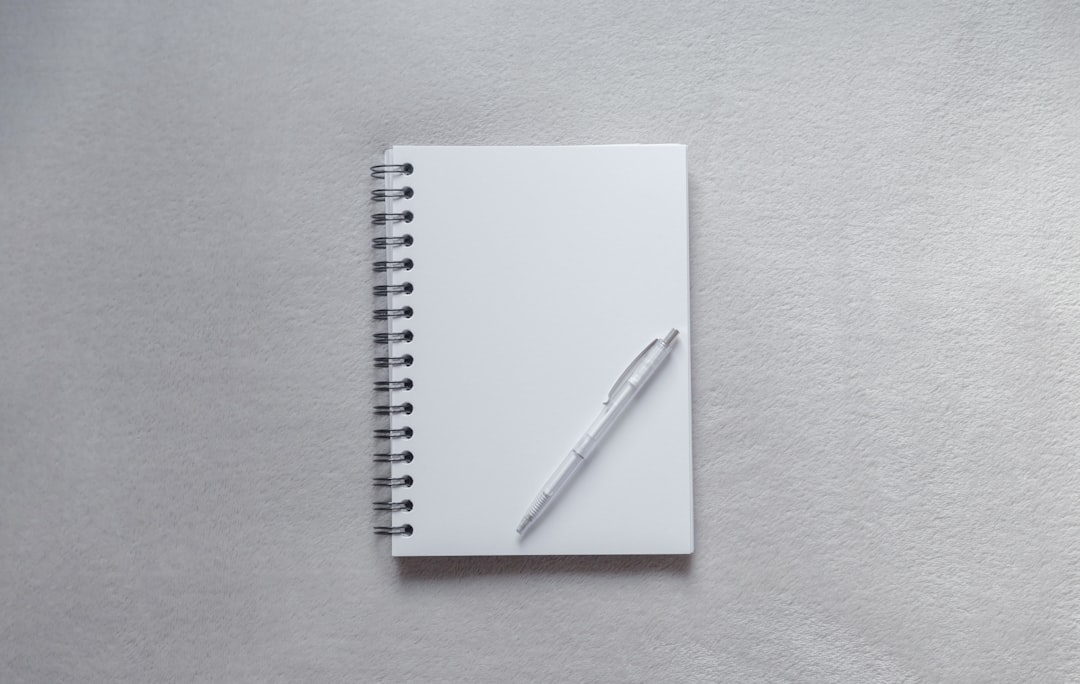 Minimalist clean black notebook and fountain pen, representing privacy-focused minimalist note-taking