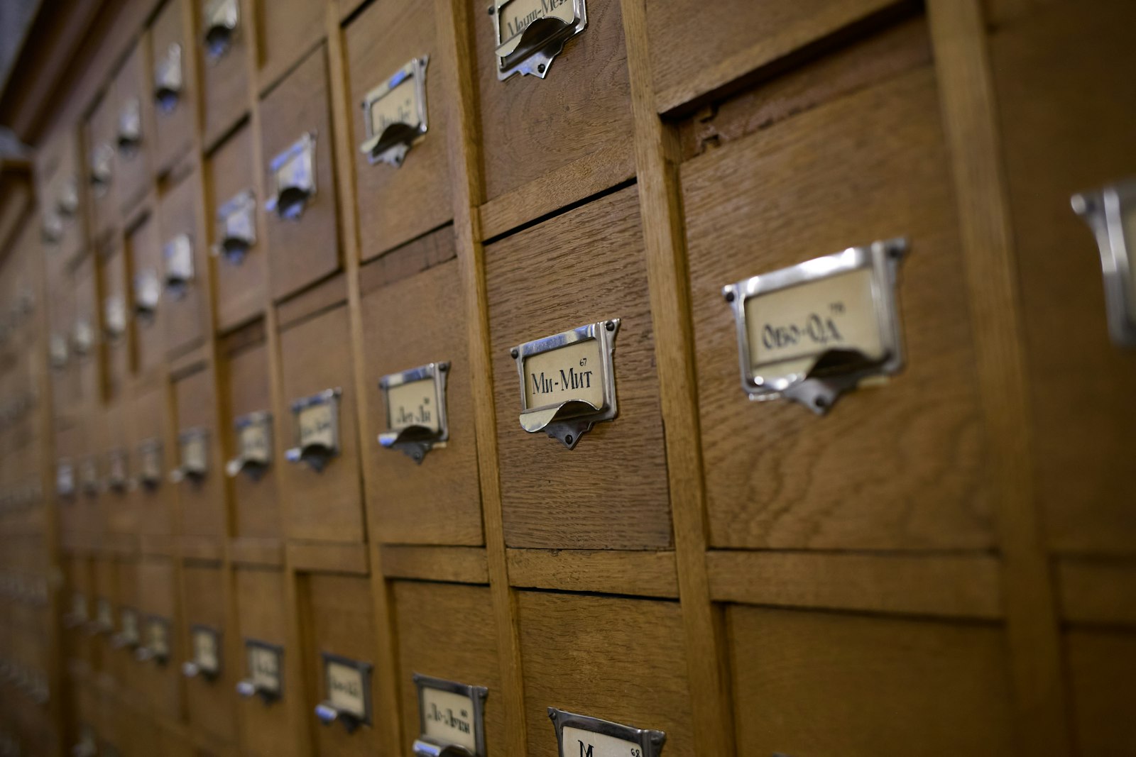 Wooden library card catalog drawers with small labelled index cards, representing notes filed so they can be found again