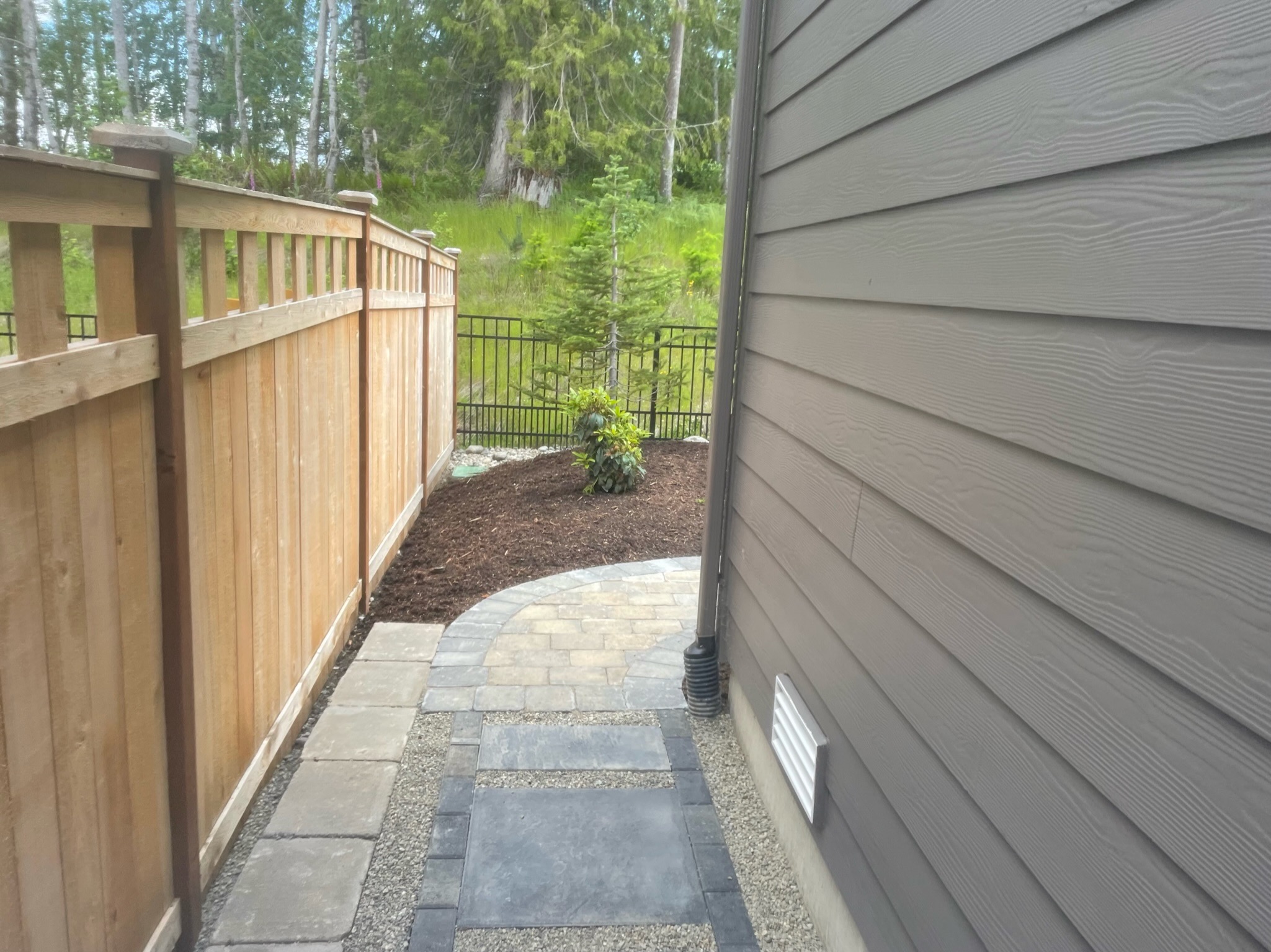 Todd's Nursery patio with pavers, mulch, and plants in Puyallup, WA