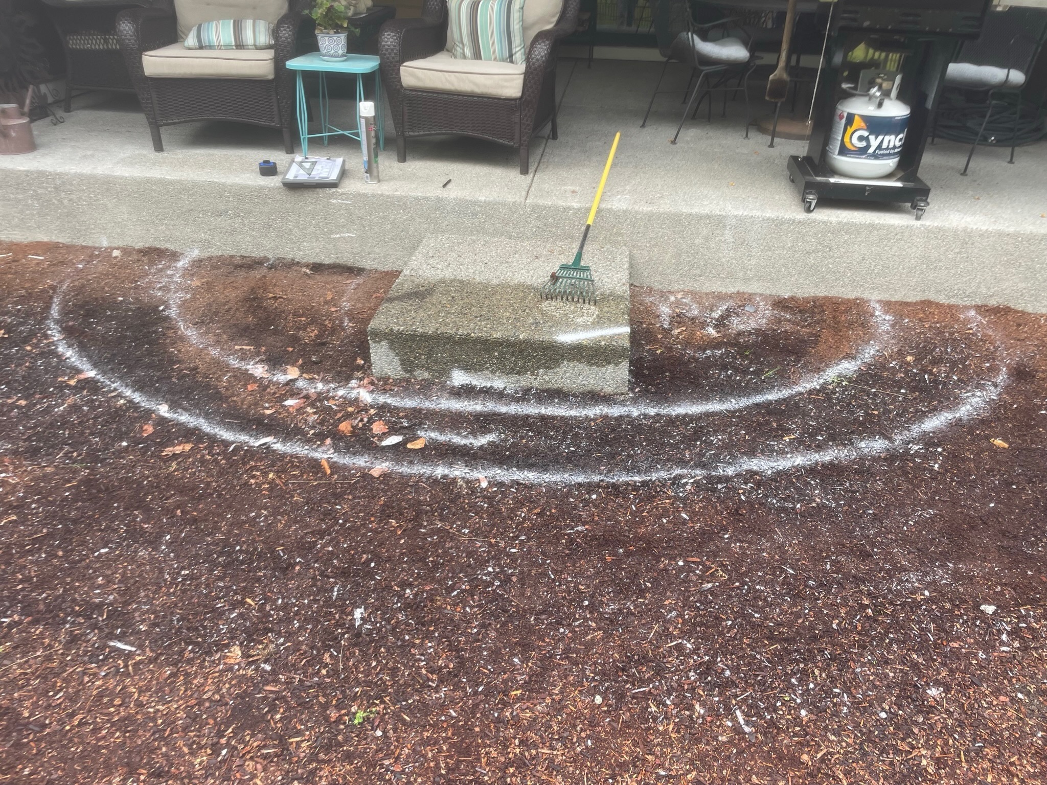 Patio preparation with mulch and concrete slab at Todd's Nursery, Puyallup, WA