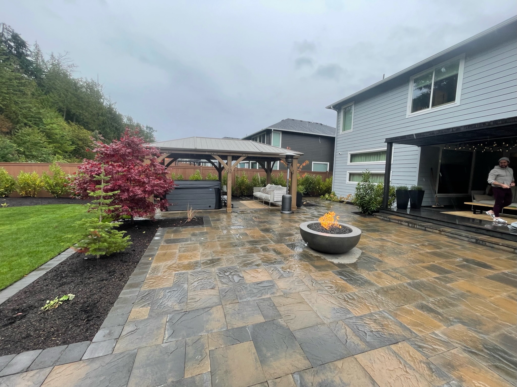Spacious patio with fire pit, gazebo, and Japanese maple at Todd's Nursery in Puyallup, WA