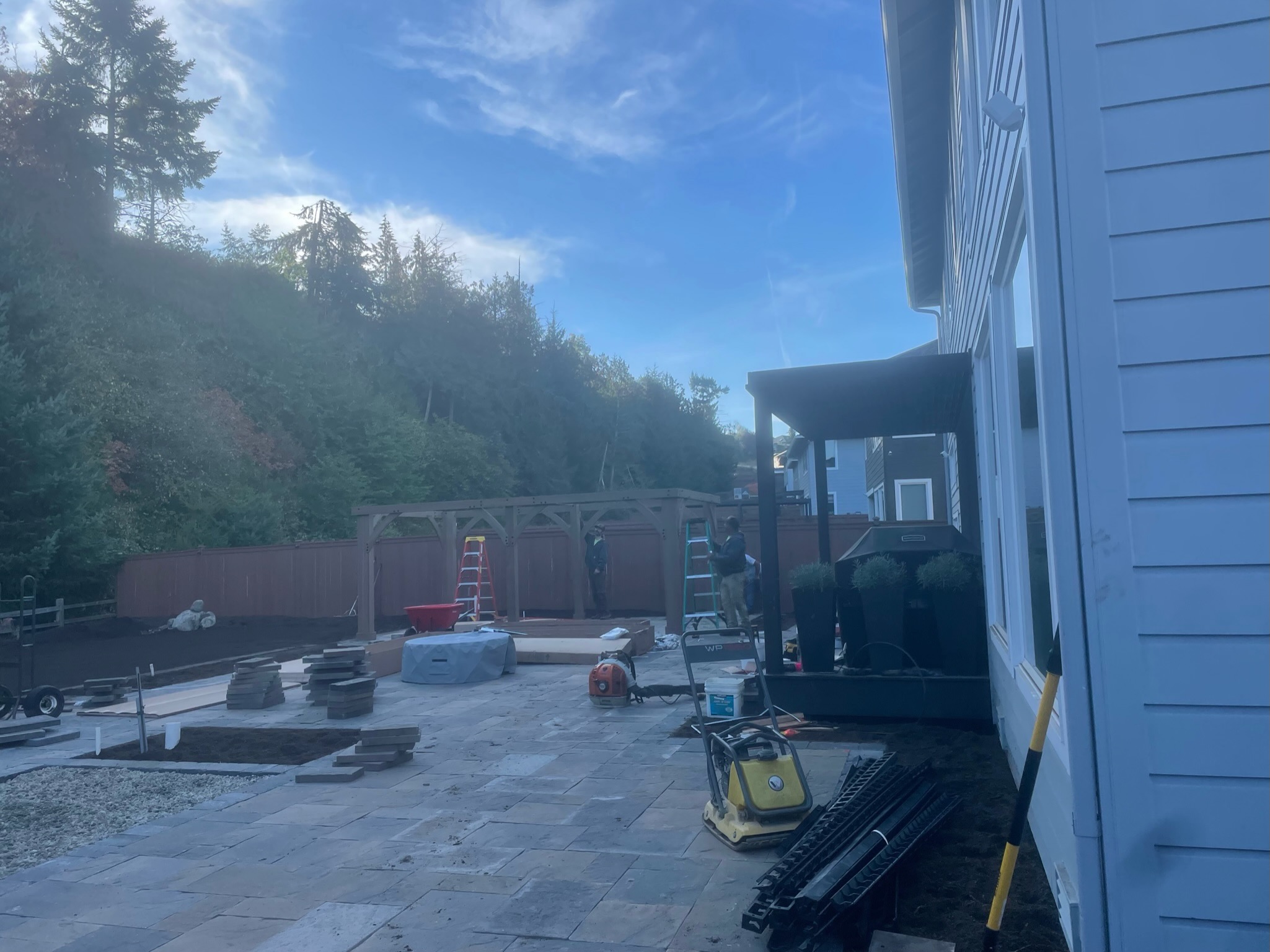Todd's Nursery patio with pergola, slate pavers, and planters in Puyallup, WA