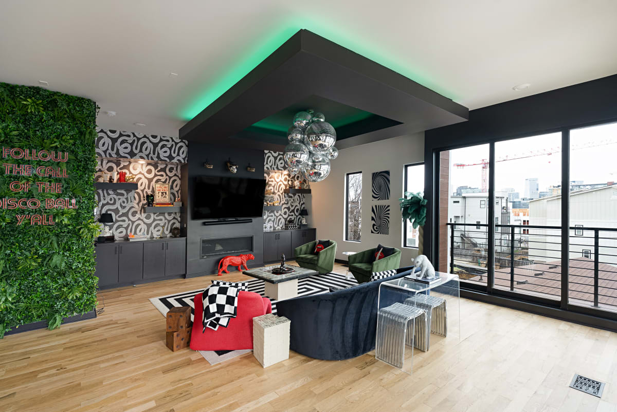 Living Room with Disco Ball Neon Sign