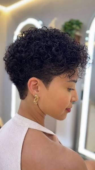 Short Haircuts for Women: The Ultimate Guide from Pixie to Bob 3 Short curly pixie haircut with defined curls and volumetric crown