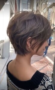 asiática cabelo curto com franja longa