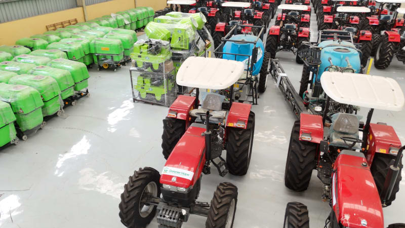 Origin Automobile Works boom sprayers and tractors