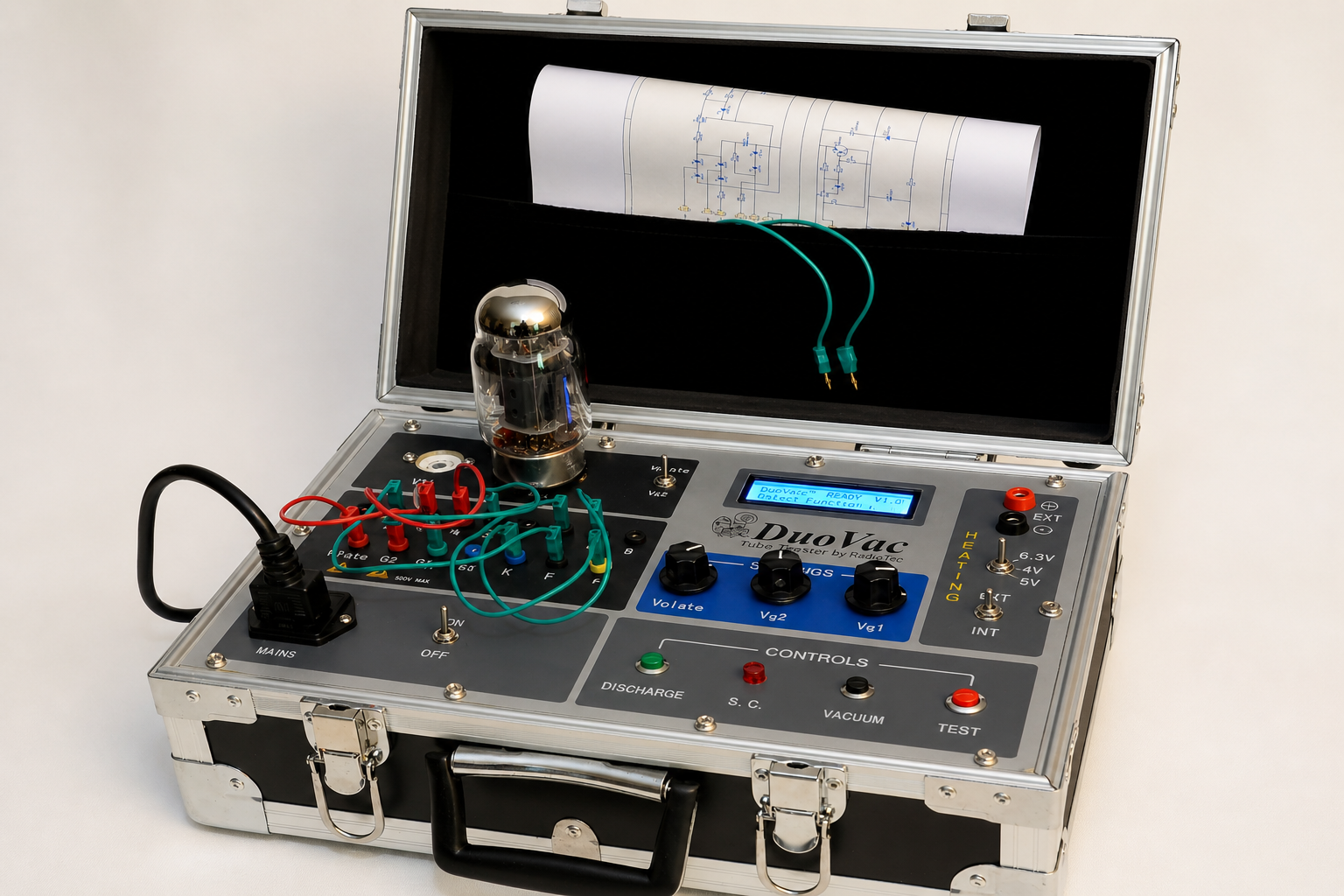 Portable measurement case with electronic components, vacuum tube, LCD screen, dials, and wiring.