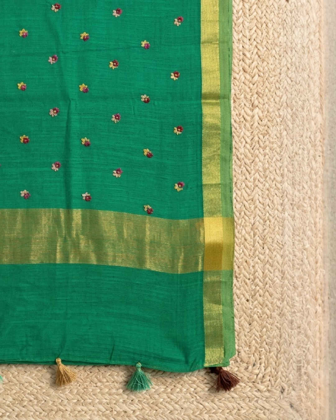 Classic Green Saree with Zari Border and Delicate Floral Motifs