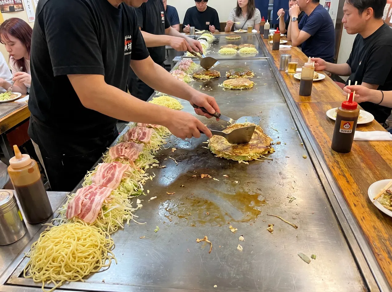 Hiroshima style okonomiyaki with noodles layered pancake