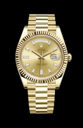 Rolex Day-Date 40 Yellow Gold / Champagne - Baguette