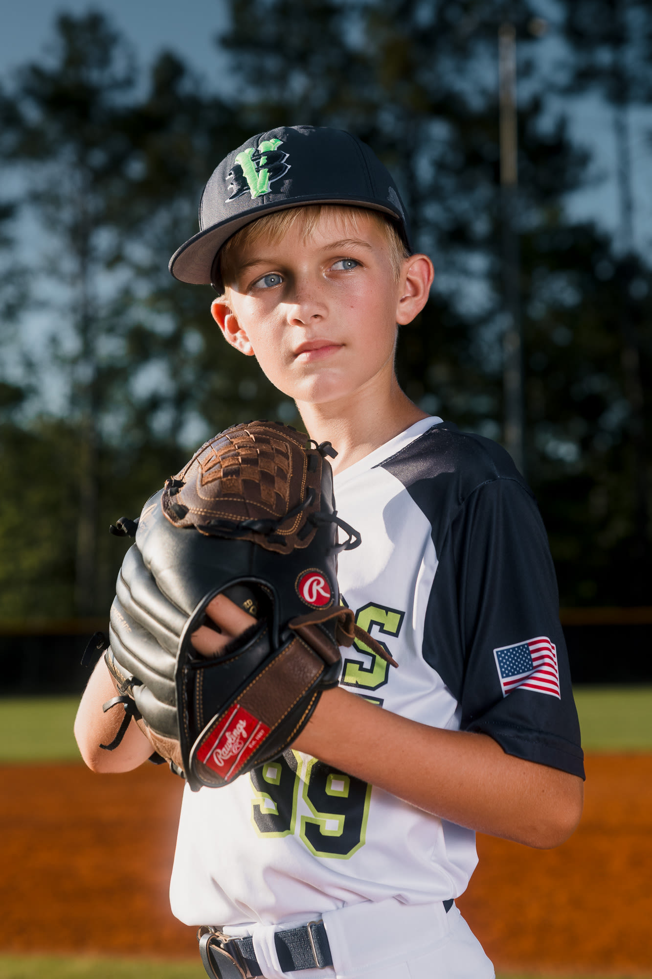 Outdoor sports portrait glowing with warm backlight.
