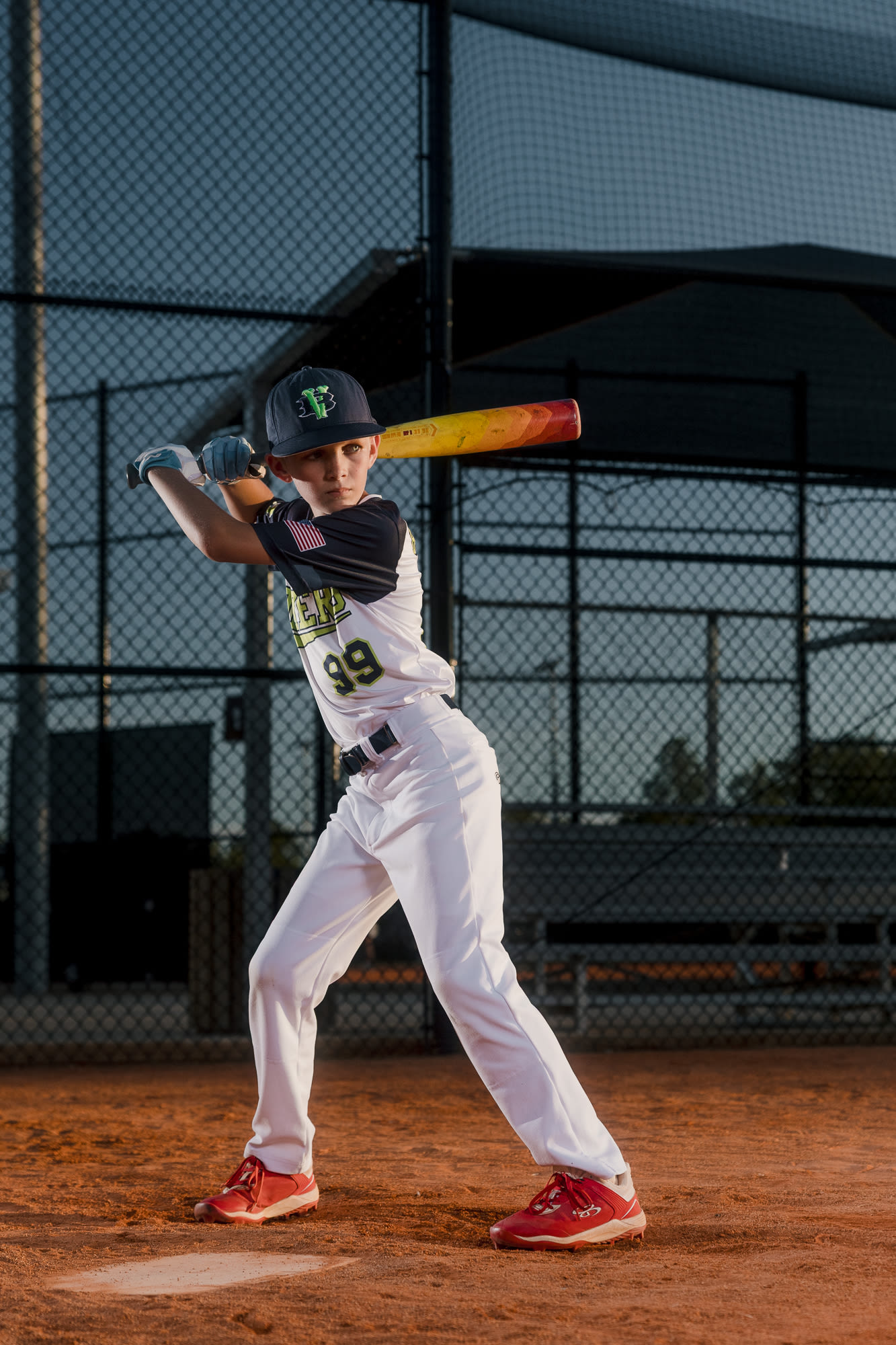Graphic half-body portrait with crisp edge lighting.