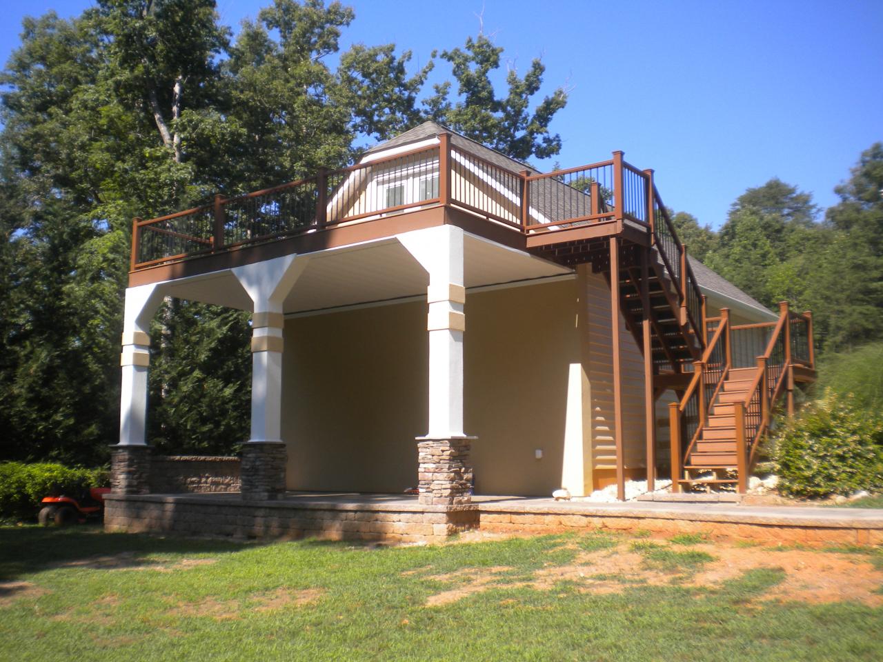 Large back porch with railings