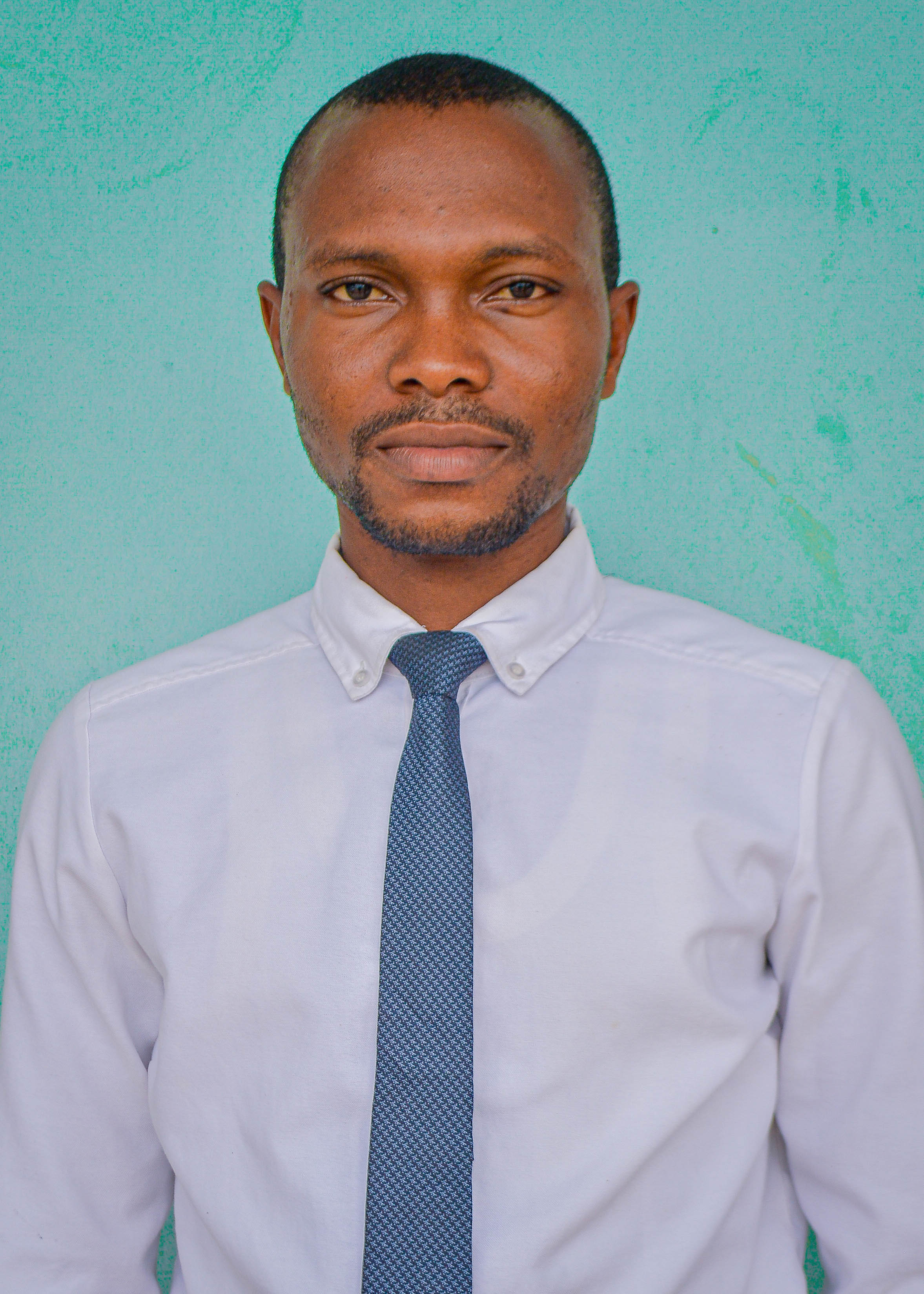 Mr. B.K Olusegun - Exam Officer