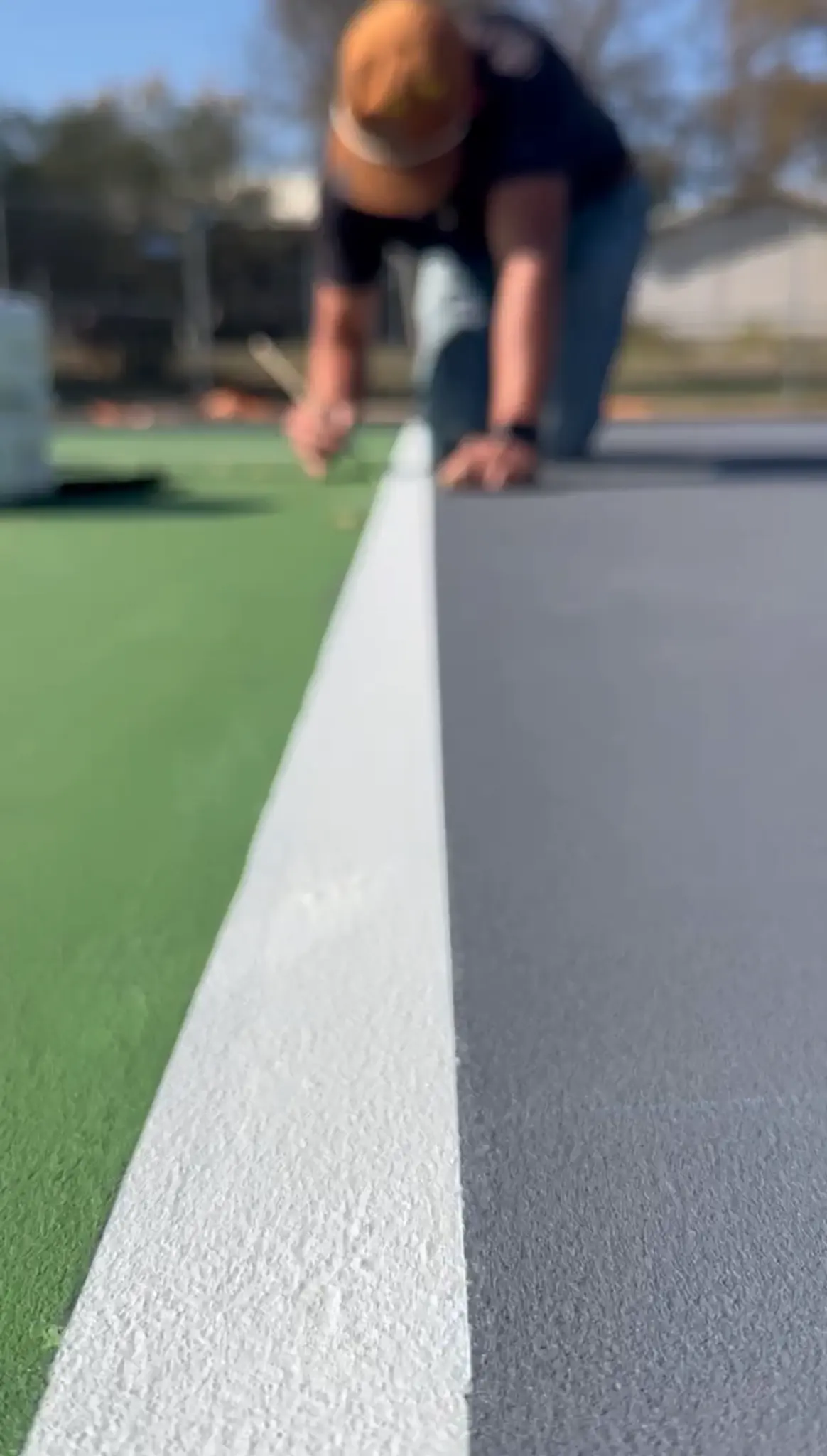 Precision court line marking close-up