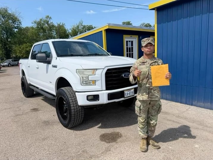 A Key Konnect customer with their new car on the lot in Killeen